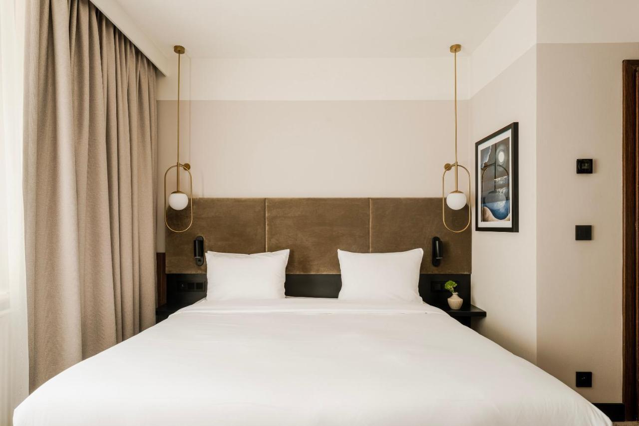 Royal Tulip Sand كولوبرزيغ المظهر الخارجي الصورة A bedroom at the hotel