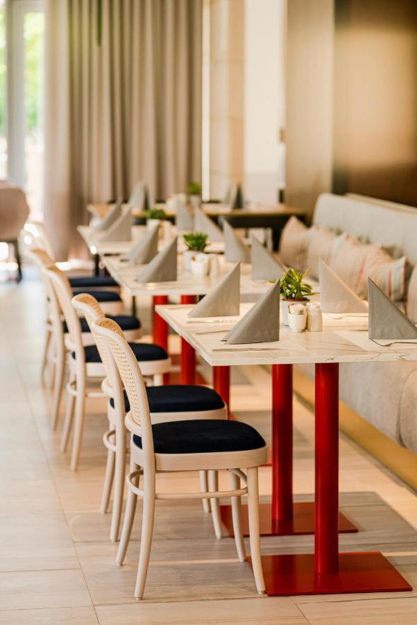 Royal Tulip Sand كولوبرزيغ المظهر الخارجي الصورة Restaurant