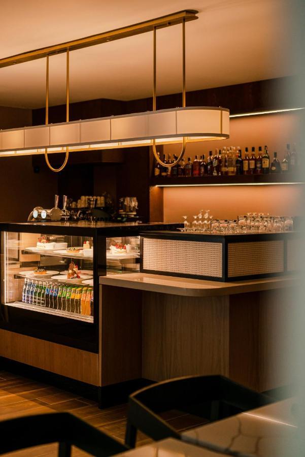 Royal Tulip Sand كولوبرزيغ المظهر الخارجي الصورة The bar at the lounge