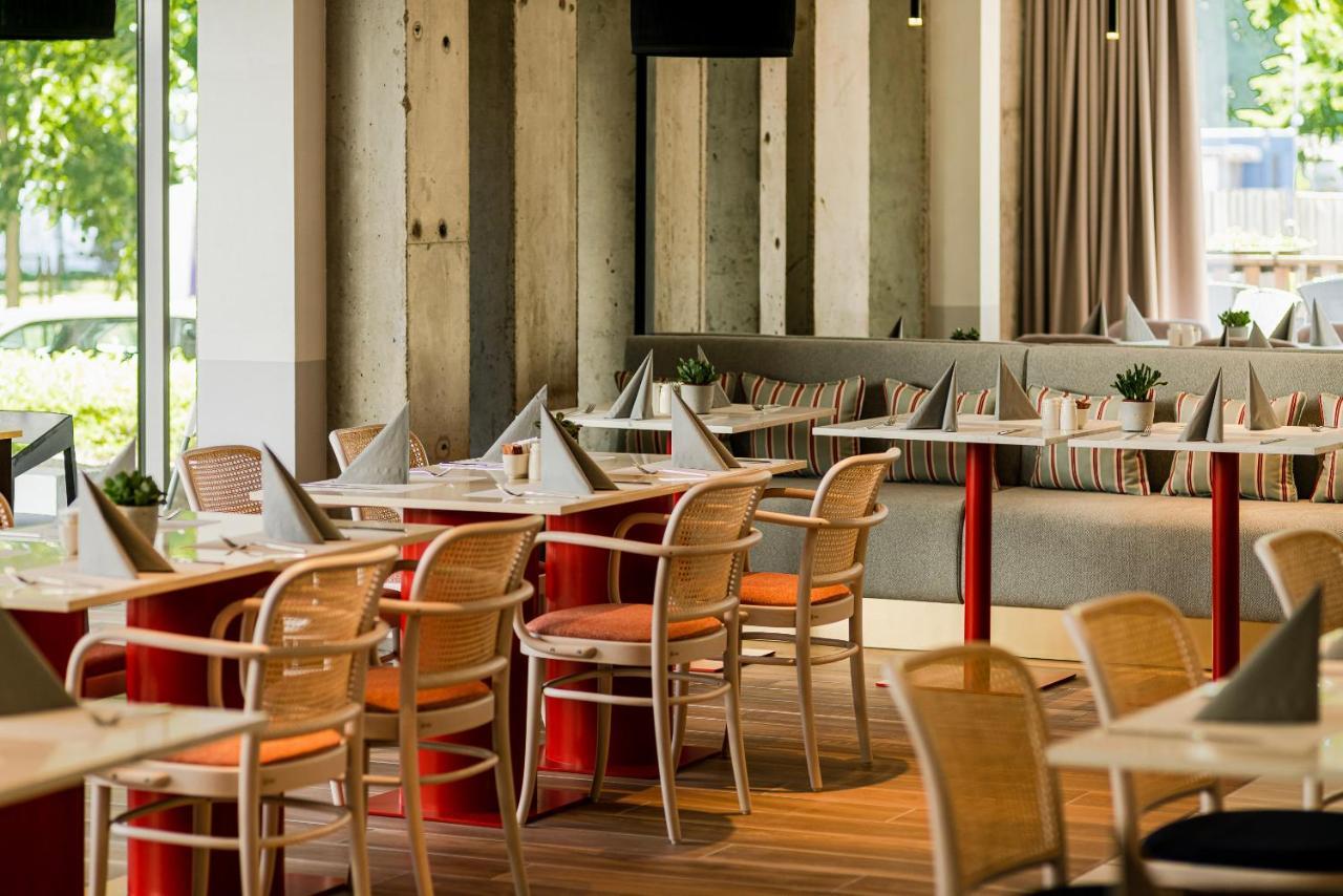 Royal Tulip Sand كولوبرزيغ المظهر الخارجي الصورة Restaurant